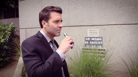 Man vaping electronic cigarette Stock Footage 64455059