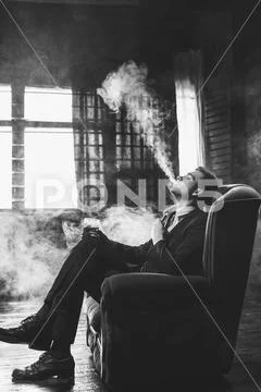 Man vaping fumes relax enjoyment Stock Photos