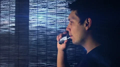 Man is vaping in slow motion Stock Footage 66254977