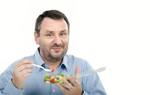 Man with vegetable salad Stockfoto's