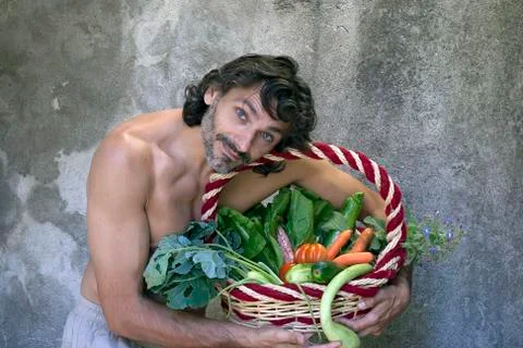 Man with vegetables Stock Photos