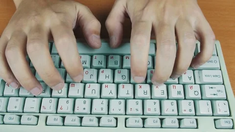 The man is very fast typing on the keyboard Stock Footage 70170193
