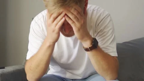 The man is very upset. Stock Footage 219553568