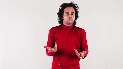 Man very upset mood looking unhappy smiling talking on white background Stock Footage 262936128