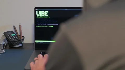 Man Vibe Codes From LLM CLI AI Software 스톡 동영상 332083705