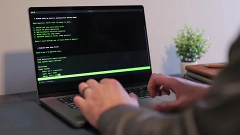 Man Vibe Codes From LLM CLI AI Software 스톡 동영상 332083707