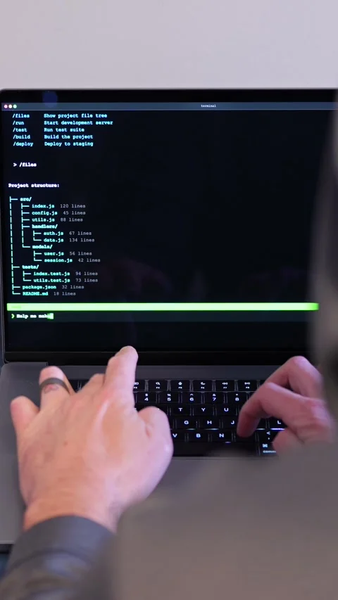 Man Vibe Codes From LLM CLI AI Software 스톡 동영상 332083725