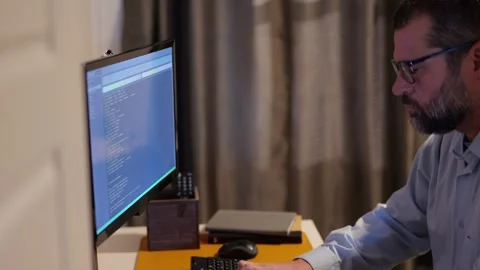 Man Vibe Coding Crypto Coin with AI LLM Tools Stock Footage 322691622