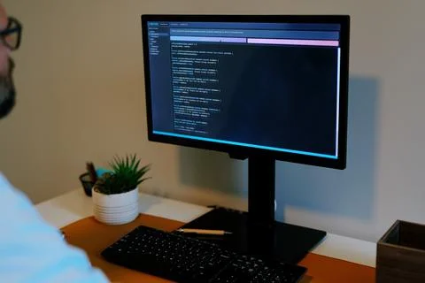 Man Vibe Coding Crypto Coin with AI LLM Tools 스톡 사진