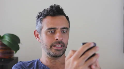 Man video call on his mobile phone Stock Footage 40525436