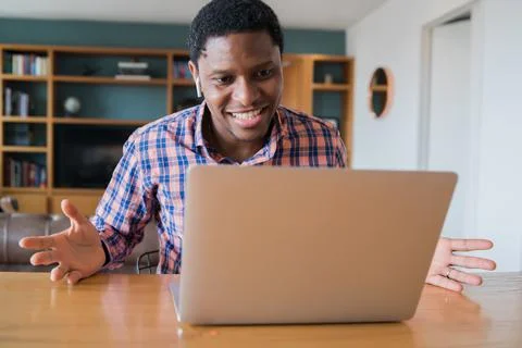 Man on a video call from work. Stock Photos
