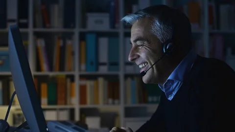Man video calling at night Stock Footage 89197637