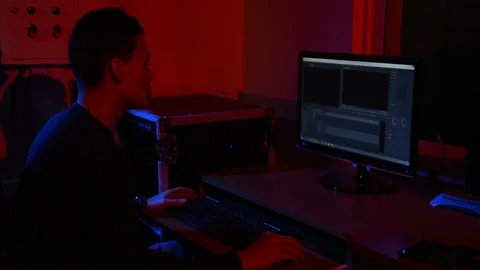 Man video editor working with footage on computer Stock Footage 303404491