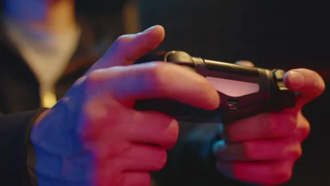 Man with videogame controller, joystick, gamepad, gaming console close up play. Stock-Footage 328238836