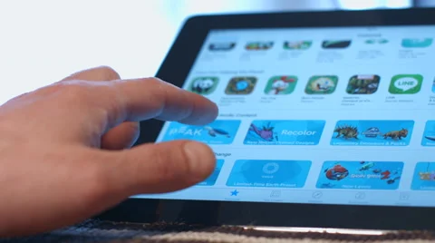 The man in the viewing application on the tablet computer Video stock 62866944