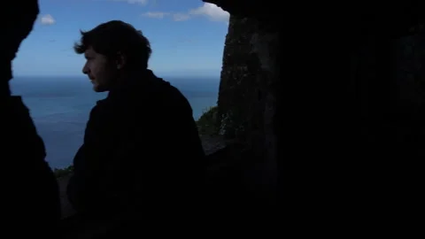 Man viewing the sea from a view point Stock Footage 336620323