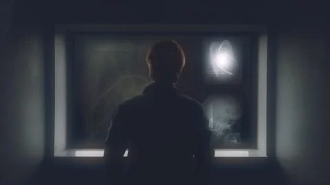 Man Viewing XRay Scans on Illuminated Light Box in Clinic Stock Footage 341502682
