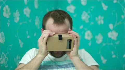 Man in Virtual Reality Glasses Giving Thumbs-Up Stock Footage 60386104