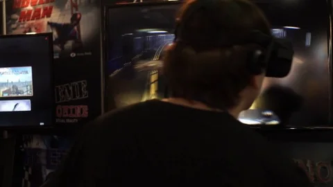 Man in virtual reality glasses playing video game car extreme driving Stock Footage 80875604