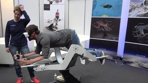 Man in virtual reality headset on Icaros company stand on exhibition Cebit 2017 Stock Footage 74391697