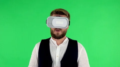 Man with virtual reality headset or 3d glasses. Green screen Stock Footage 120802541
