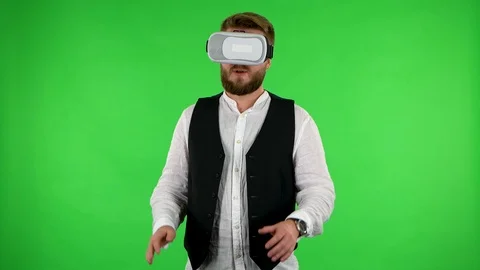 Man with virtual reality headset or 3d glasses. Green screen Stock Footage 120804438