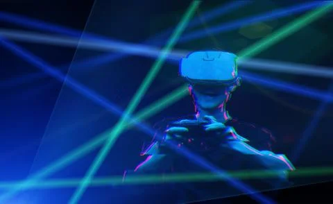 Man with virtual reality headset is playing game. Image with glitch effect. Stock Photos