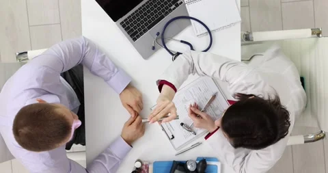 Man with vision problems visiting neurologist in clinic top view Stock Footage 295254133