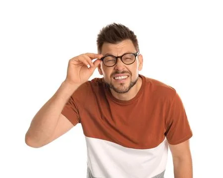 Man with vision problems wearing glasses on white background Stock Photos