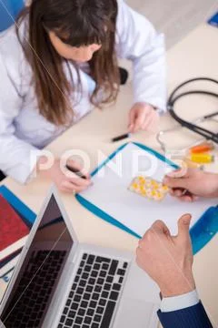 Man visiting doctor for routine check-up Stock Photos