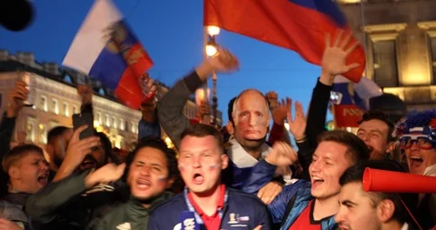 Man with Vladimir Putin mask among Russian happy people celebrating in street Stock Footage 91698853