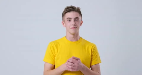 Man vlogger talking on white background Video stock 144959680