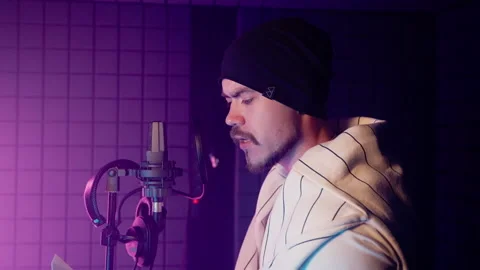 Man voice actor working in audio studio Stock Footage 242205837