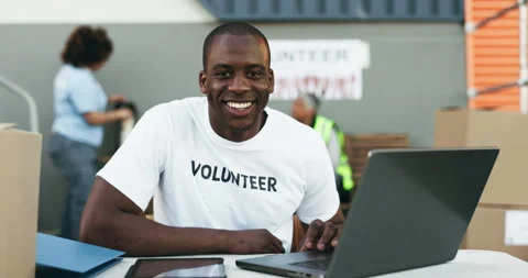 Man, volunteering and computer for online donation, community service and Video stock 248815036