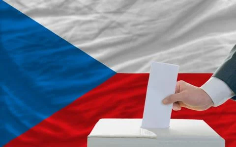 Man voting on elections in czech in front of flag Stock Photos