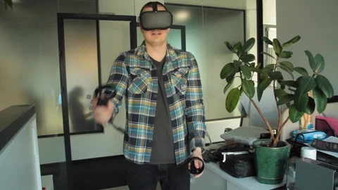 Man in VR glasses Stock Footage 125986840