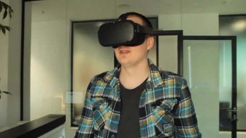 Man in VR glasses Stock Footage 125986875
