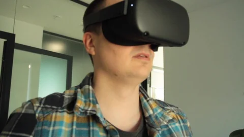 Man in VR glasses Stock Footage 125986878