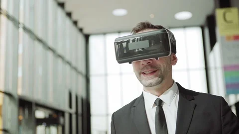 Man in VR glasses having video call on move Stock Footage 108682907