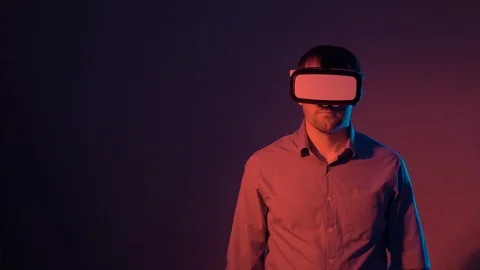 Man in VR goggles gesturing with hands Stock Footage 101753096