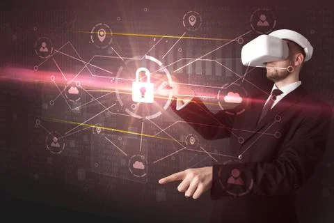 Man with VR goggles unlocking 3D network concept Foto stock