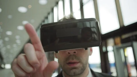 Man in VR goggles working with visualized data Stock Footage 108682882