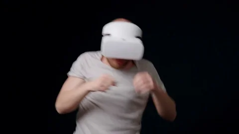 Man in VR headset boxing Stock Footage 75178115