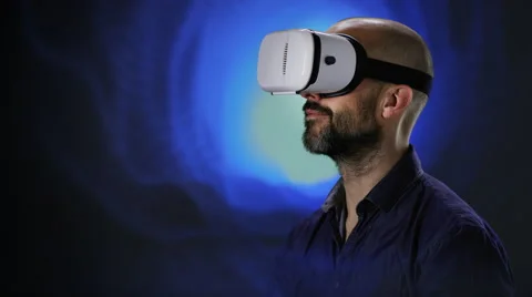 Man with VR headset looking around Stock Footage 62787714
