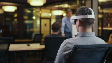 Man in VR headset in modern office Stock Footage 218118335