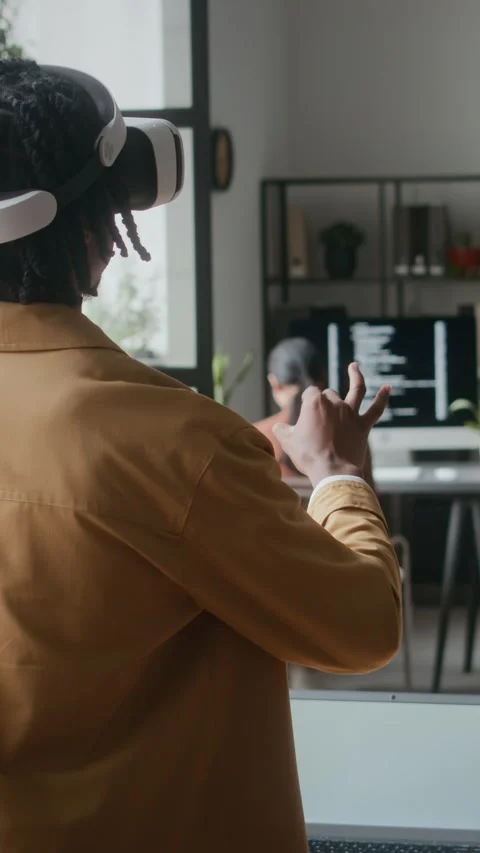 Man in VR Headset Testing New Application at Work in Office Video stock 306744965