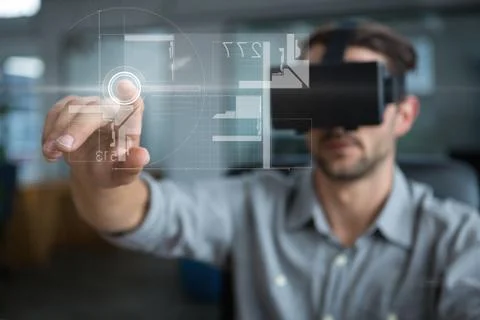 Man in VR headset touching interface with flare 스톡 사진