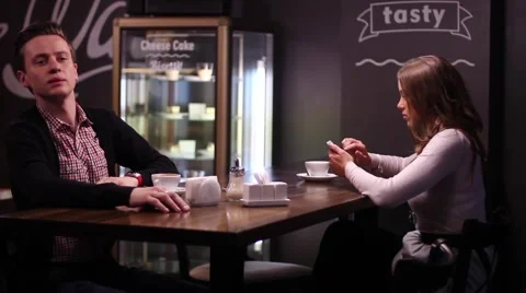 Man waiting for someone in a cafe and Stock Video Pond5