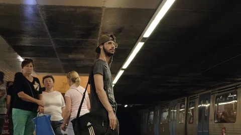 Man waiting for the subway. Stockbeeldmateriaal 125337676