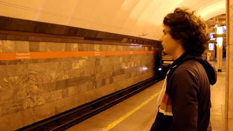 Man Waiting For Subway Train At Metro Station Video stock 70428143